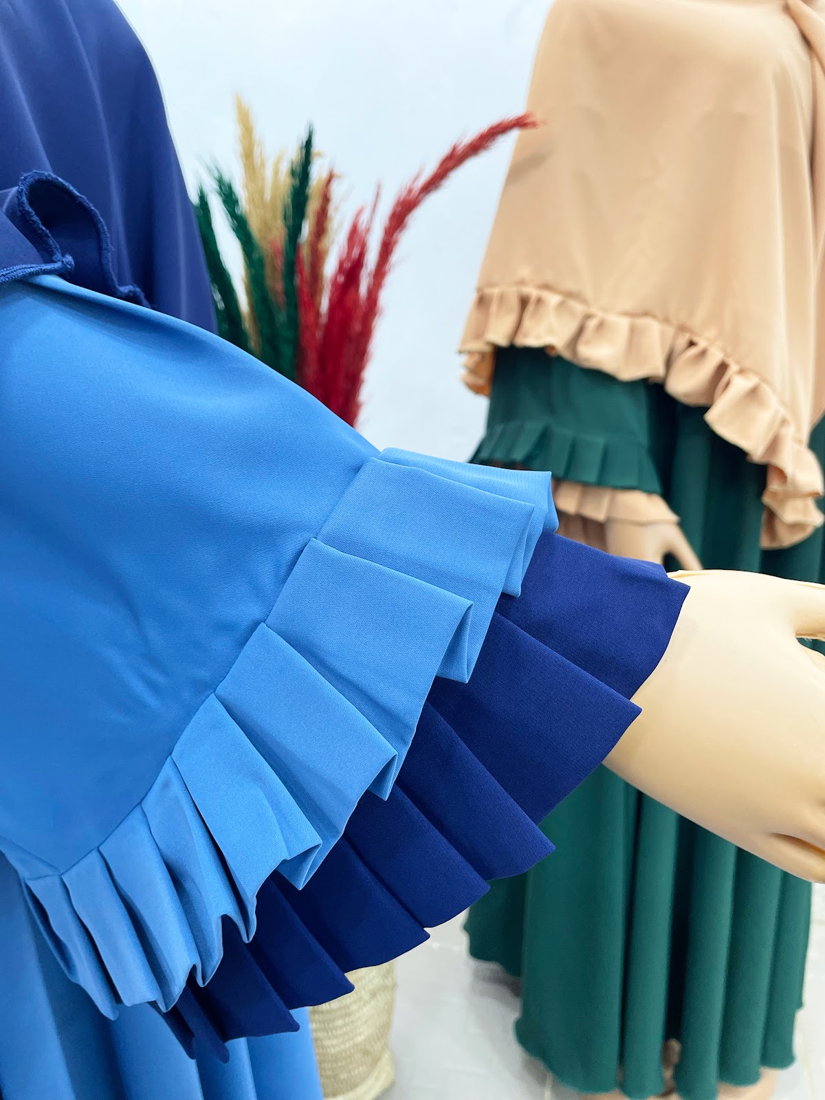 Modeste cornflower & royal blue pleated ruffle cuff detail
