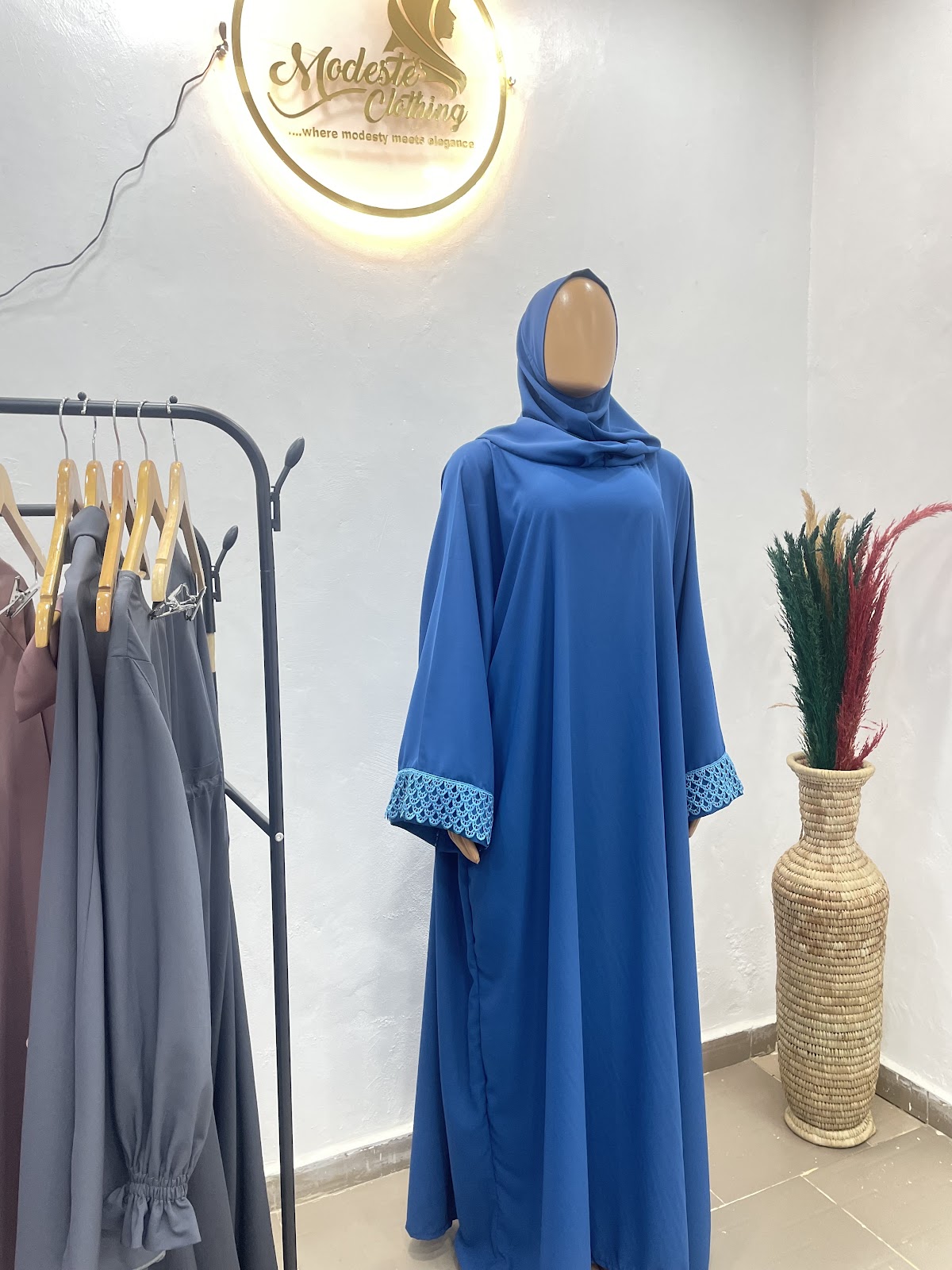 Modeste royal blue lace-cuffed occasion abaya display